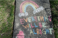 A Rainbow with Everything will be alright drawn in multi coloured rainbow